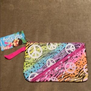 NWT waterproof swimsuit bag with piece signs on it